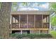 Spacious screened porch with lattice trim, wooden supports, and ample space to relax at 106 Shady Point Ct, Durham, NC 27713