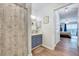 Bathroom doorway view showcases vanity, modern fixtures, and a bedroom view at 107 Sturbridge Dr, Clayton, NC 27520