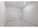 Empty walk-in closet with a carpeted floor and wire shelving at 1080 River Glade Ct # 17, Graham, NC 27253