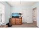 Cozy bedroom featuring carpet and a window for natural light and a dresser at 112 Nelson Ln, Clayton, NC 27527