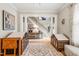 Spacious entryway with wooden floors, staircase, columns, and stylish décor at 112 Nelson Ln, Clayton, NC 27527