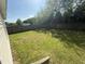 Expansive backyard features lush green grass and a wooden fence at 118 Hawthorn Dr, Clayton, NC 27520