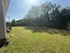 Spacious fenced backyard with green grass, perfect for outdoor activities and relaxation at 118 Hawthorn Dr, Clayton, NC 27520