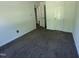 Bedroom with carpet and an adjoining door at 118 Hawthorn Dr, Clayton, NC 27520