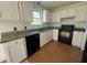 Modern kitchen with granite countertops, sleek appliances, and ample cabinet space at 118 Hawthorn Dr, Clayton, NC 27520