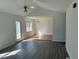 Open living area with hardwood-look flooring and natural light at 118 Hawthorn Dr, Clayton, NC 27520