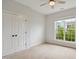 Bedroom with natural light and neutral carpeting at 1212 Sand Pine Dr, Cary, NC 27519