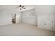 Bonus room showcasing neutral carpet, bright white walls, and a ceiling fan at 1212 Sand Pine Dr, Cary, NC 27519