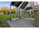 Charming outdoor courtyard with metal benches, decorative pergolas, and well-maintained landscaping at 1242 Coach Station Aly # 101, Raleigh, NC 27601