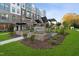 New townhomes with a landscaped courtyard and outdoor seating area at 1242 Coach Station Aly # 101, Raleigh, NC 27601