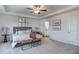 Beautiful main bedroom with tray ceiling and adjacent bathroom at 129 Sagamore Ave., Angier, NC 27501