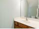Bathroom with vanity and a framed mirror at 1307 Montreux Ct, Mebane, NC 27302