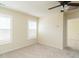 Bright bedroom with neutral carpet and two windows featuring white shutters at 1307 Montreux Ct, Mebane, NC 27302