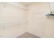 This walk-in closet features ample shelving, providing plenty of storage space at 1307 Montreux Ct, Mebane, NC 27302