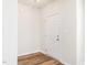 Bright foyer featuring wood-look flooring and a white front door at 1307 Montreux Ct, Mebane, NC 27302