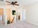 Neutral carpet in the upstairs hallway featuring open doors and a stairway landing at 1307 Montreux Ct, Mebane, NC 27302