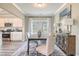 A formal dining area featuring a large window, modern furnishings, and decorative accents at 132 Sagamore Avenue, Angier, NC 27501