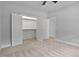 Bright bedroom with a walk-in closet and neutral carpeting at 1412 Sagamore Dr, Louisburg, NC 27549
