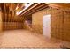 Unfinished bonus room provides a versatile space to customize with a door at 1412 Sagamore Dr, Louisburg, NC 27549