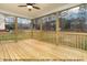 Relaxing screened porch features wood flooring and natural light at 1412 Sagamore Dr, Louisburg, NC 27549