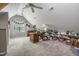 Spacious attic area with carpeted floors, natural light, and storage solutions, perfect for organization at 146 Bennett Pl, Clayton, NC 27527