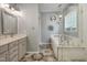 This luxurious bathroom has a glass shower and a large bathtub at 146 Bennett Pl, Clayton, NC 27527