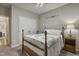 Bedroom with a comfortable bed, classic decor, and plenty of natural light from side windows at 146 Bennett Pl, Clayton, NC 27527