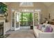 Relax in the living room with access to the outdoor deck with french doors at 146 Bennett Pl, Clayton, NC 27527