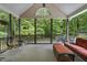 Inviting outdoor porch with comfortable seating and a view of lush greenery, perfect for relaxation at 146 Bennett Pl, Clayton, NC 27527