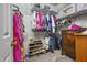 Well organized walk-in closet with shelves and drawers for ample storage at 146 Bennett Pl, Clayton, NC 27527