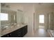 A spacious bathroom features double sinks and a large mirror at 1549 Lily Creek Dr, Cary, NC 27518