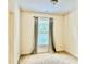 Small bedroom includes neutral carpet and walls, window with curtains at 1549 Lily Creek Dr, Cary, NC 27518