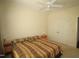 Comfortable bedroom with a large bed, bedside tables, and ample closet space at 1549 Lily Creek Dr, Cary, NC 27518