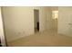 Spacious carpeted bedroom with entrances to other rooms and closet at 1549 Lily Creek Dr, Cary, NC 27518