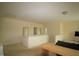 Large bonus room with carpet, a view to the downstairs, and a seating area at 1549 Lily Creek Dr, Cary, NC 27518
