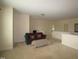 Upstairs bonus room features a cozy seating area and overlooks the lower level at 1549 Lily Creek Dr, Cary, NC 27518