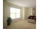 Spacious bonus room with a bright window, comfortable seating, and ample floor space at 1549 Lily Creek Dr, Cary, NC 27518