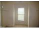 Walk-in closet with natural light and rod hanging system at 1549 Lily Creek Dr, Cary, NC 27518