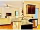 Spacious kitchen with stainless steel sink, stainless appliances, and granite countertops at 1549 Lily Creek Dr, Cary, NC 27518