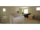 View of a living room with a comfortable sofa and a wooden desk at 1549 Lily Creek Dr, Cary, NC 27518