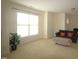 Bright living room boasts a large window and a plush sofa at 1549 Lily Creek Dr, Cary, NC 27518