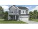 Charming gray two-story home with stone accents, complemented by a well-manicured lawn and a two-car garage at 1601 Goldfinch Perch Ln, Knightdale, NC 27545