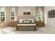 Serene main bedroom with a neutral palette, stylish decor, and natural light at 1601 Goldfinch Perch Ln, Knightdale, NC 27545