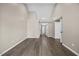 This bedroom has hardwood floors and leads to both the bathroom and a closet at 205 Hornholly Way, Holly Springs, NC 27540