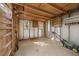 Storage shed interior with shelves, work benches, and equipment storage at 205 Hornholly Way, Holly Springs, NC 27540