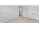 This bedroom boasts neutral carpet, light-colored walls, and a closet at 2100 Curry Meadow Way, Durham, NC 27703