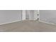 Bedroom featuring carpeted floor and neutral color, leading to a bathroom and closet at 2100 Curry Meadow Way, Durham, NC 27703