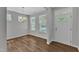 Dining room with wood floors, chandelier, and lots of light at 2100 Curry Meadow Way, Durham, NC 27703