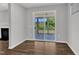 View from the inside to outside patio with houses in background at 2100 Curry Meadow Way, Durham, NC 27703