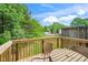 Wooden deck with neighborhood views, ideal for enjoying the outdoors at 216 Climbing Ivy Ct, Cary, NC 27511